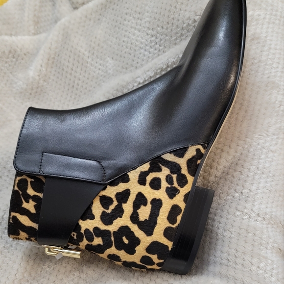 Michael Kors Shoes - New without box Michael Kors Low Black Leather Boots w/ lock & fur